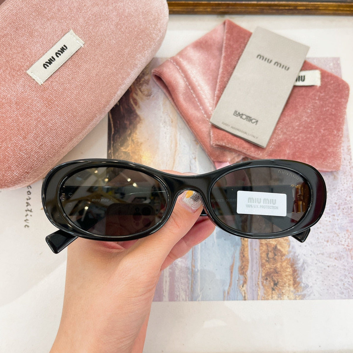 MIU M SUNGLASSES