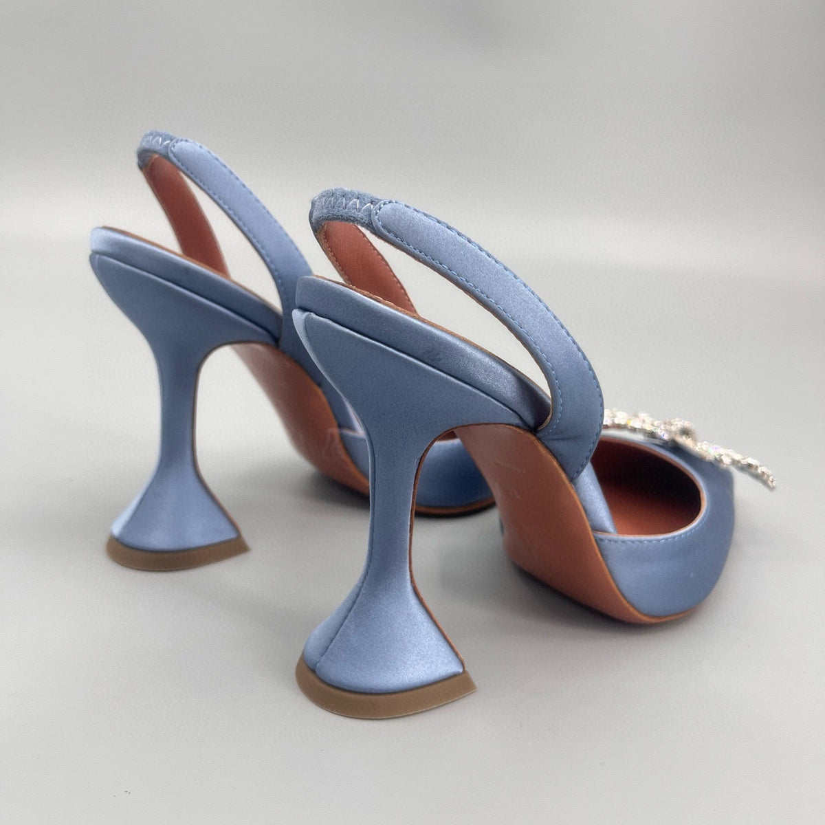AMINA M HEELS