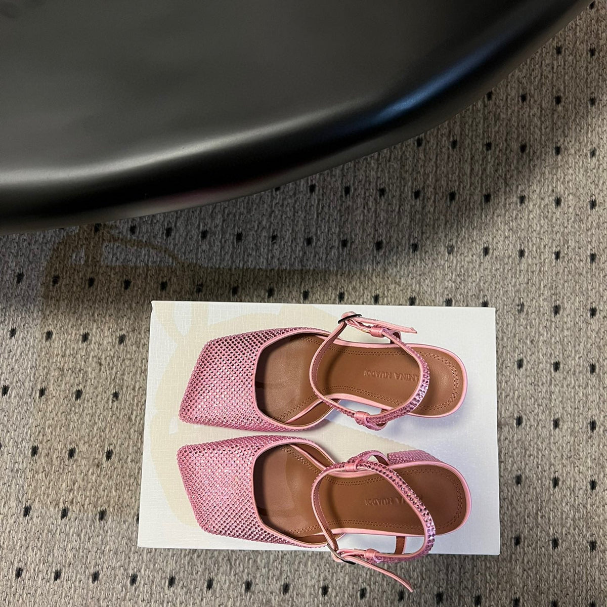 AMINA M HEELS