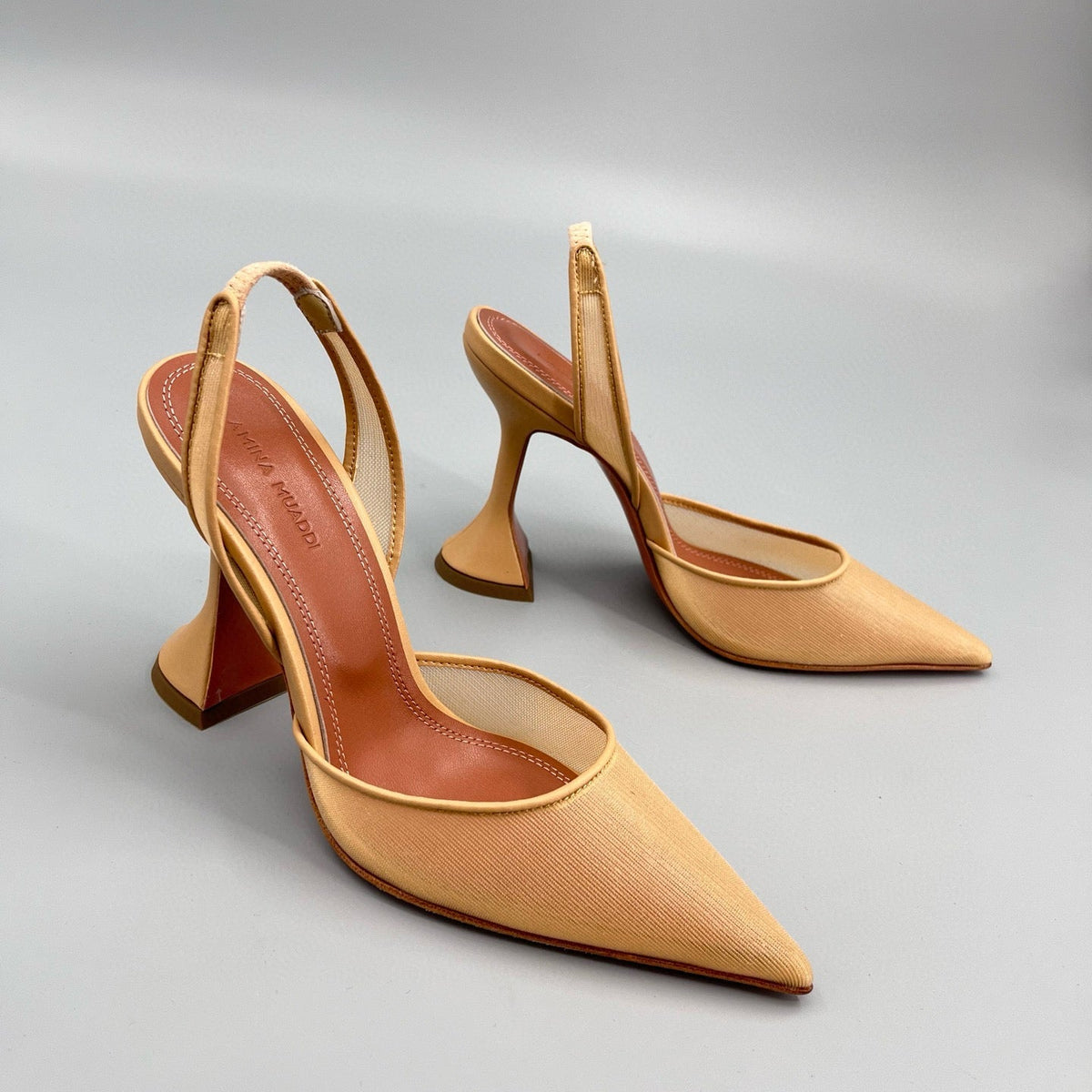 AMINA M HEELS