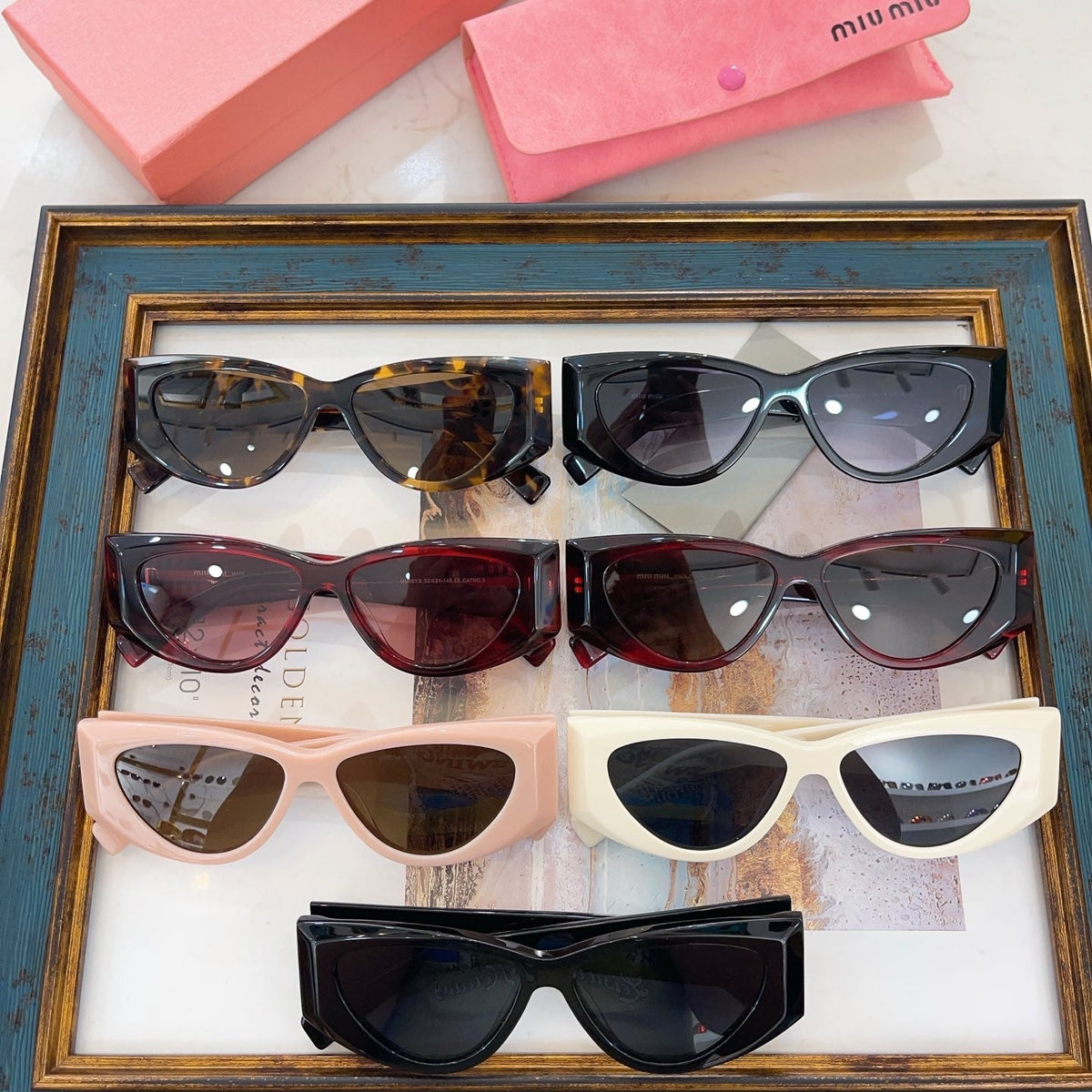MIU M SUNGLASSES