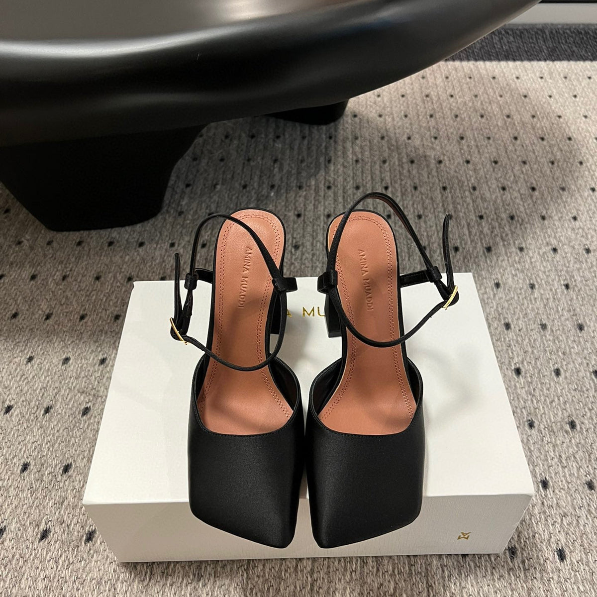 AMINA M HEELS