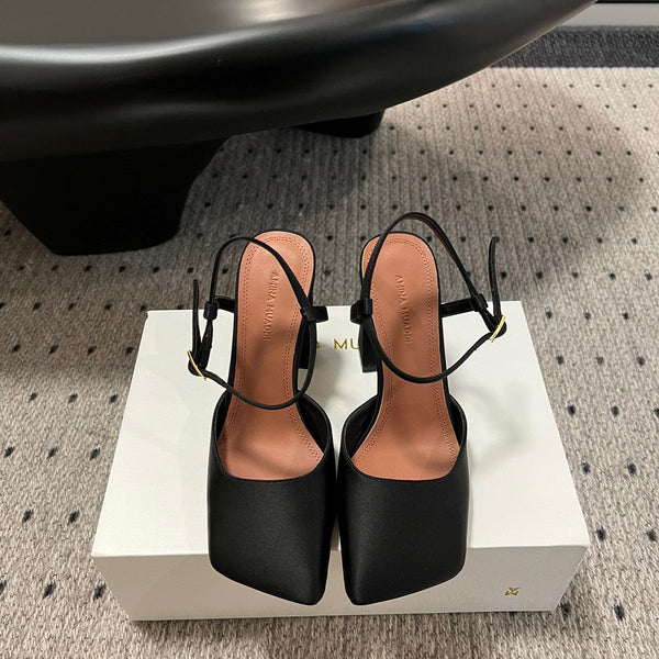 AMINA M HEELS