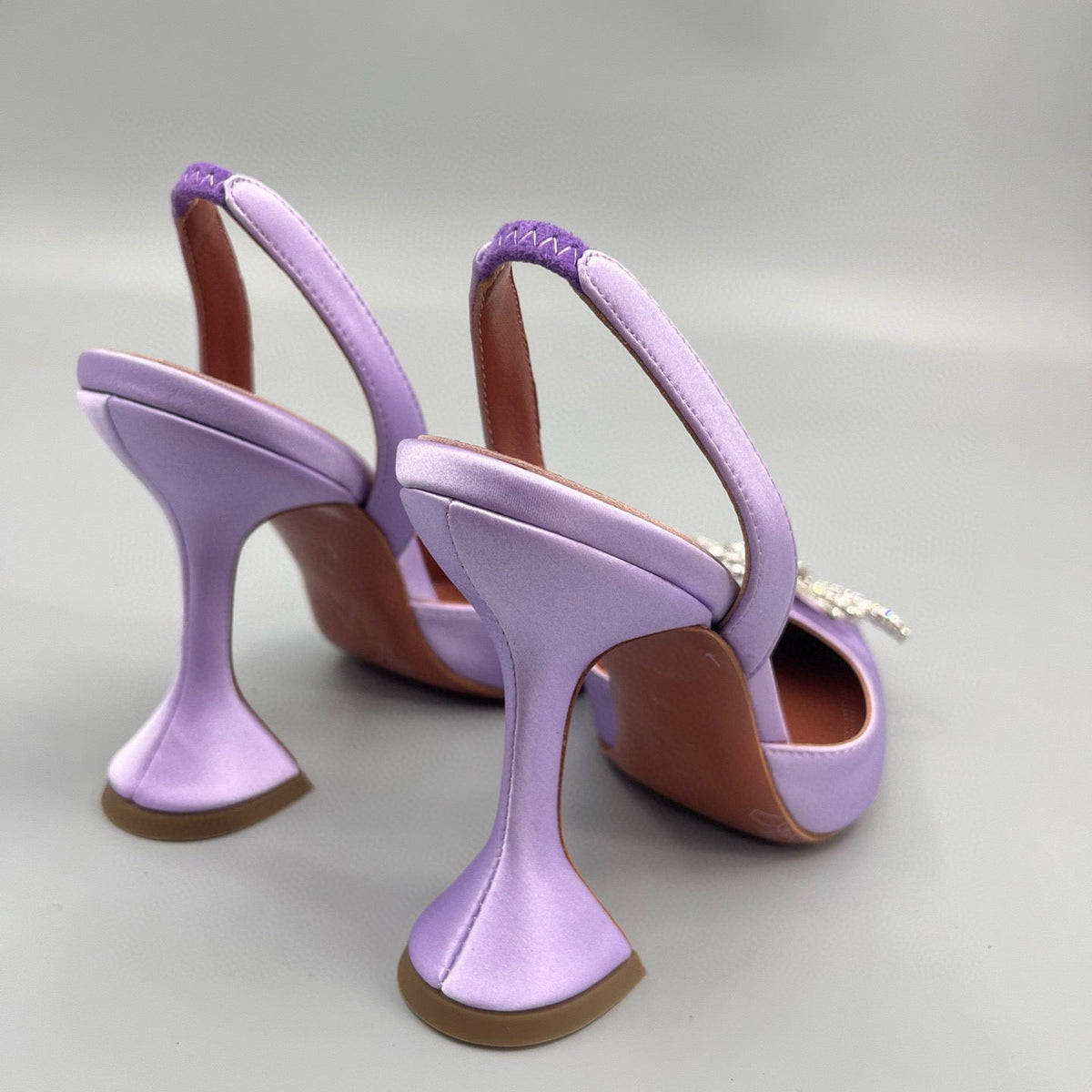 AMINA M HEELS