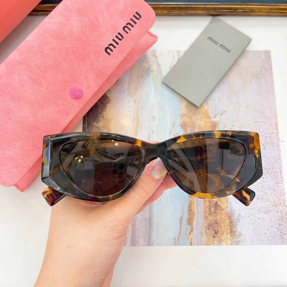 MIU M SUNGLASSES