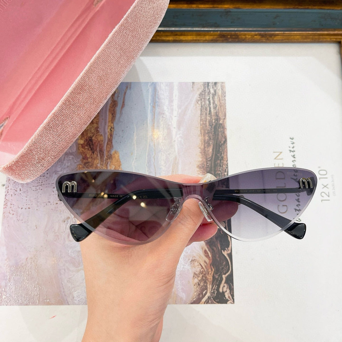 MIU M SUNGLASSES