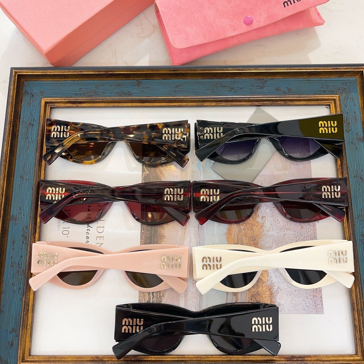 MIU M SUNGLASSES