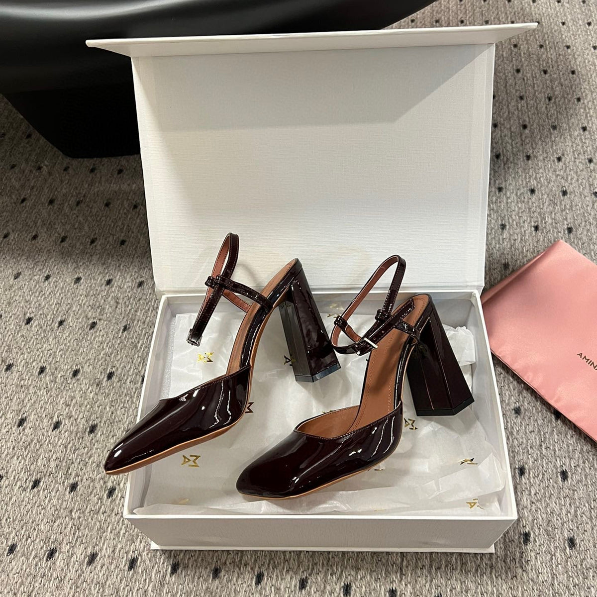 AMINA M HEELS
