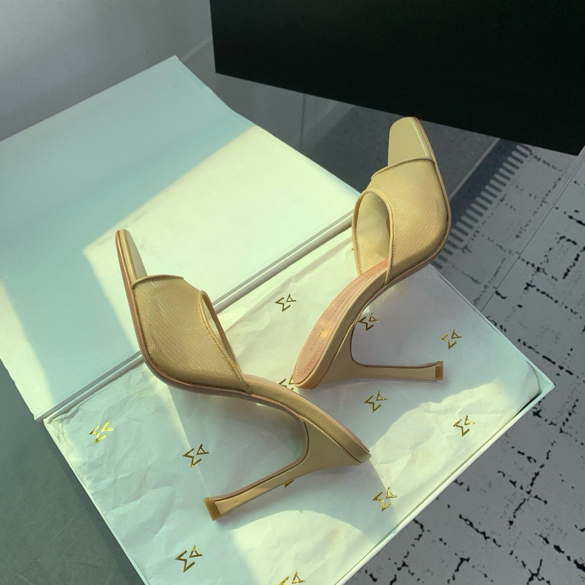AMINA M HEELS