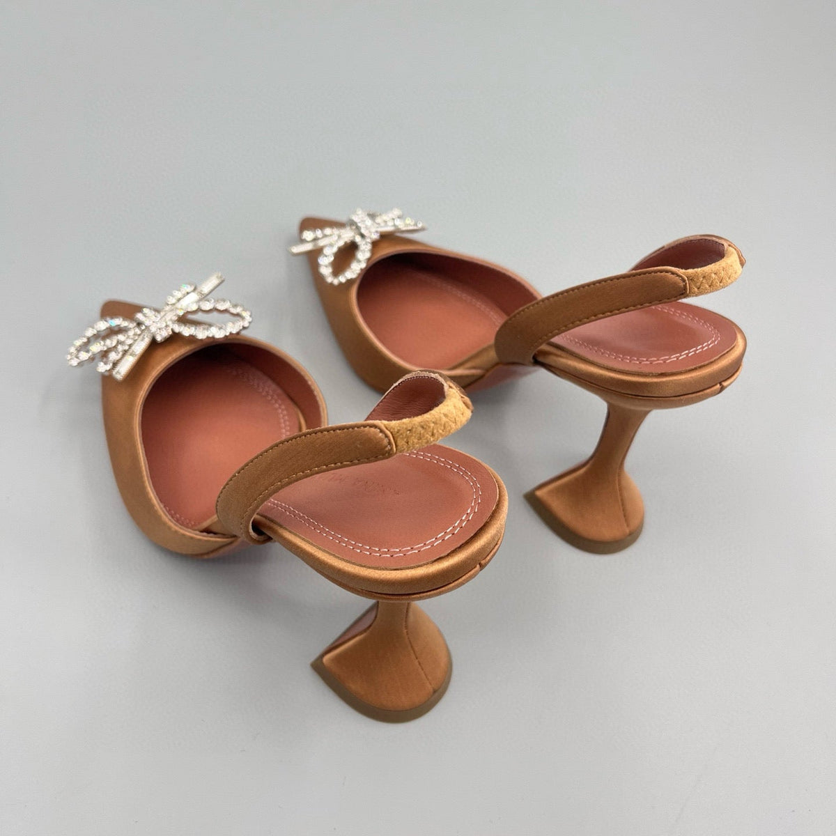 AMINA M HEELS