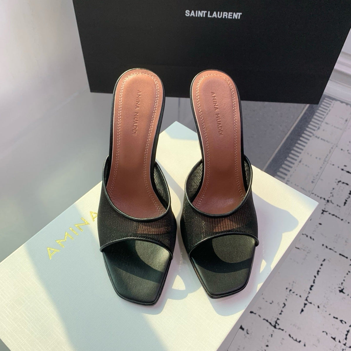 AMINA M HEELS