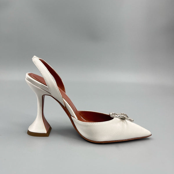 AMINA M HEELS