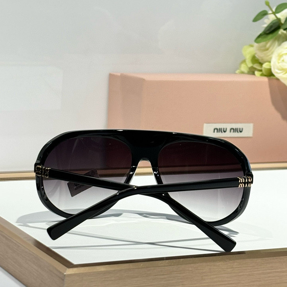 MIU M SUNGLASSES