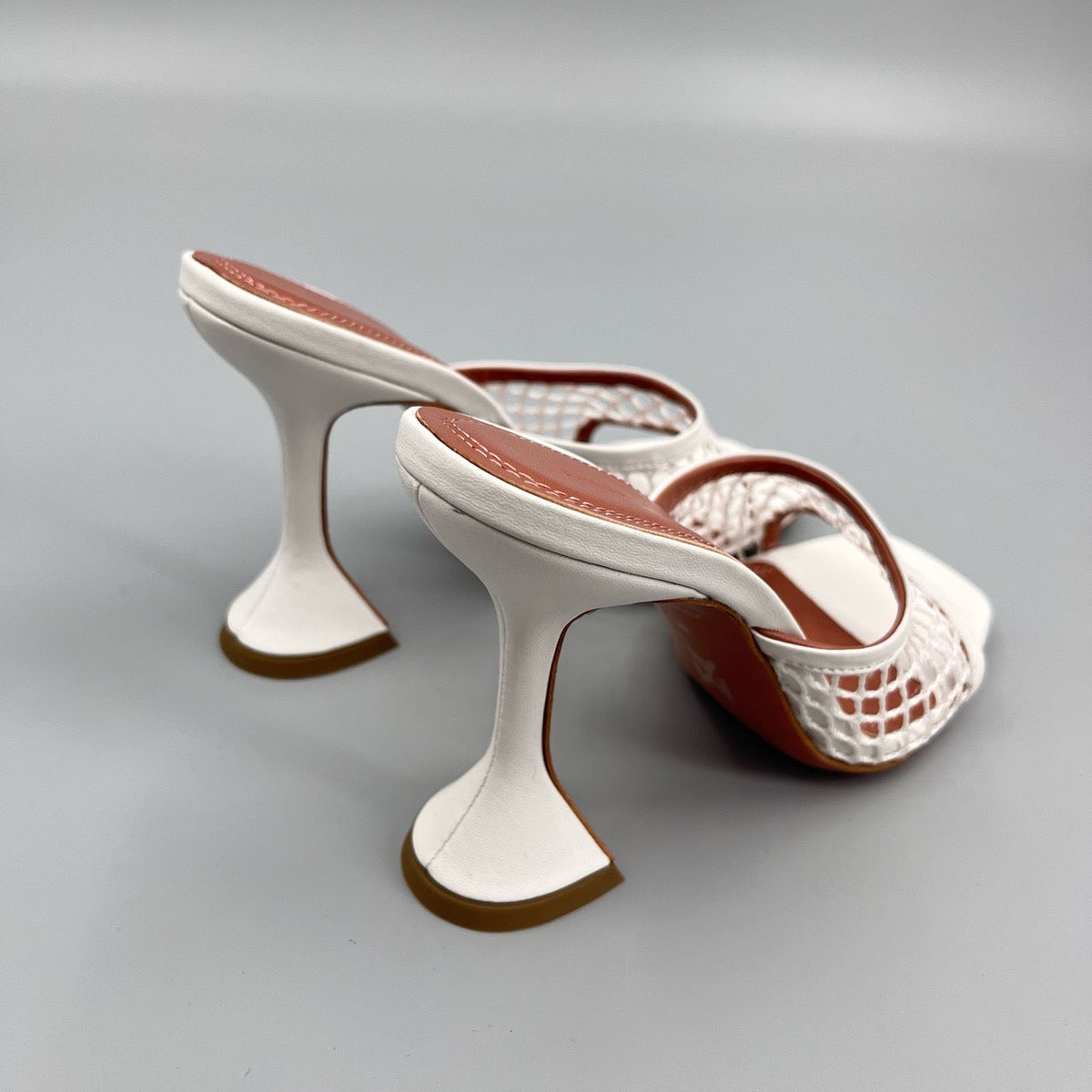 AMINA M HEELS