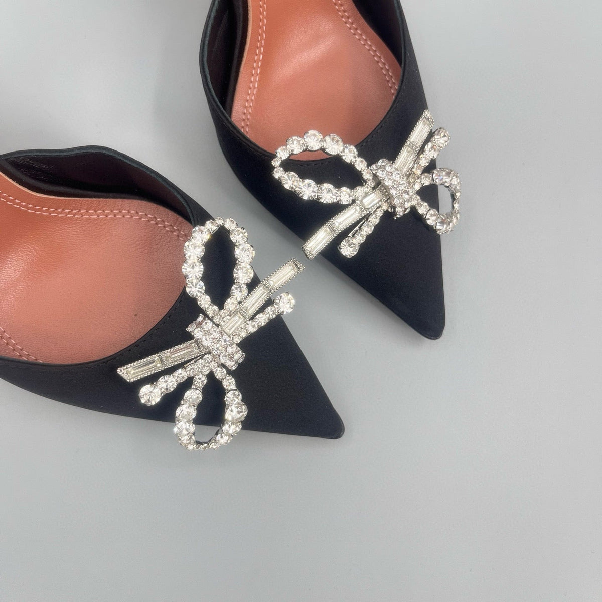 AMINA M HEELS
