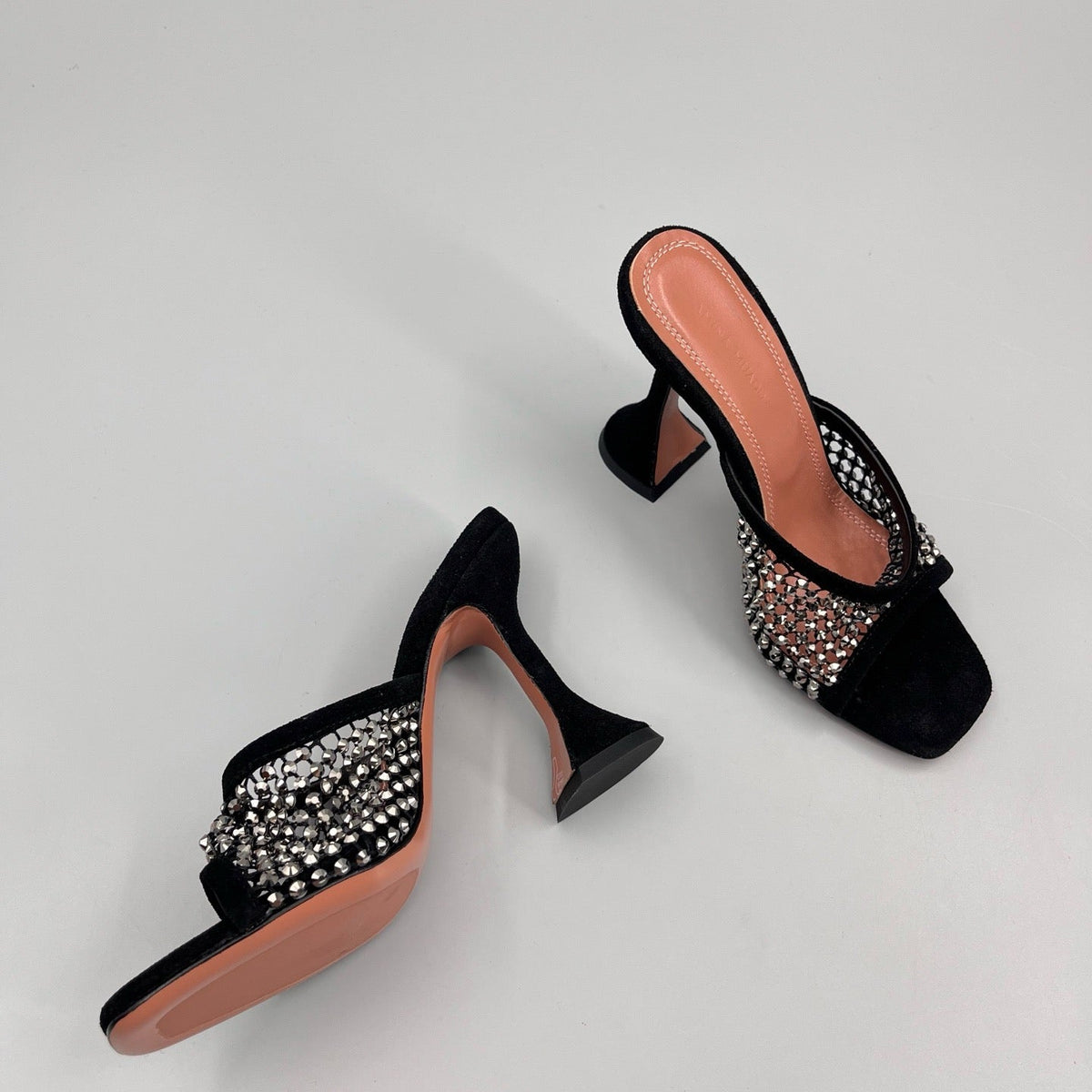 AMINA M HEELS