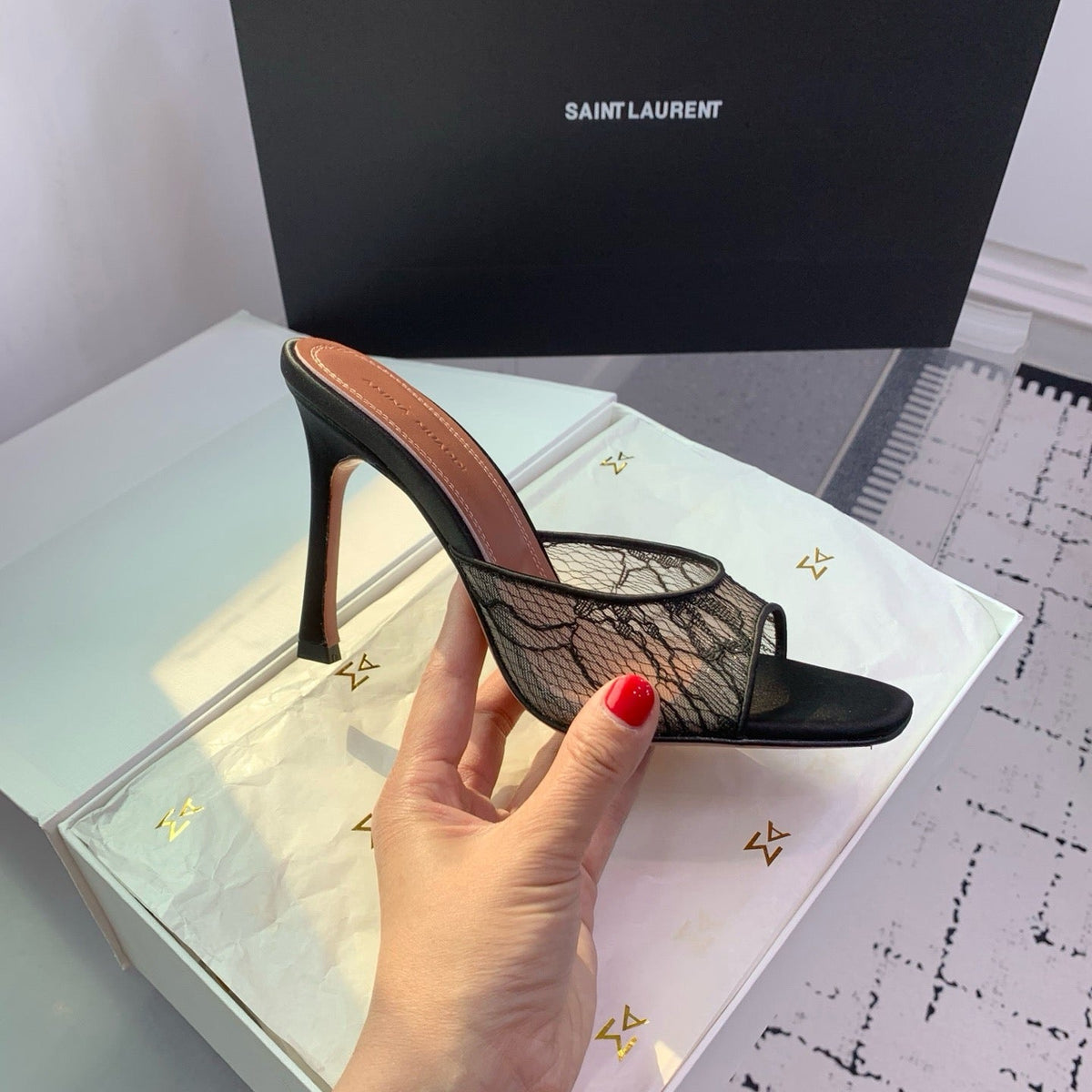 AMINA M HEELS