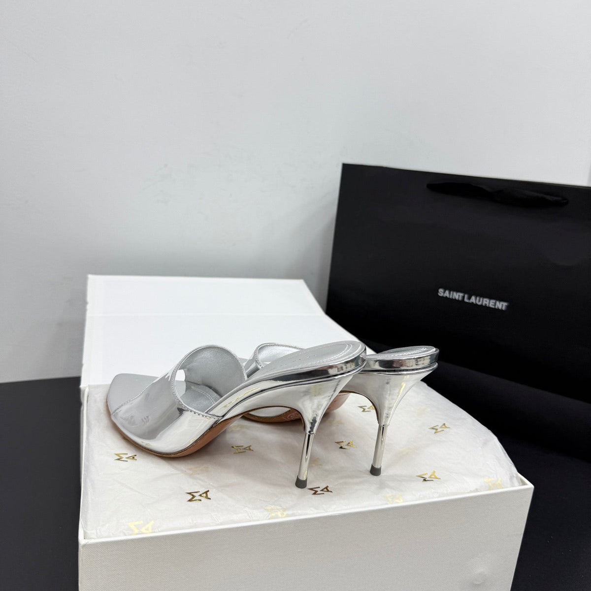 AMINA M HEELS