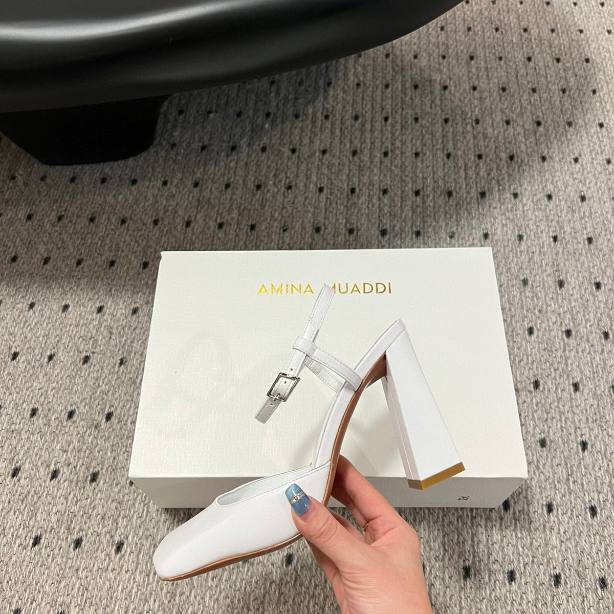 AMINA M HEELS
