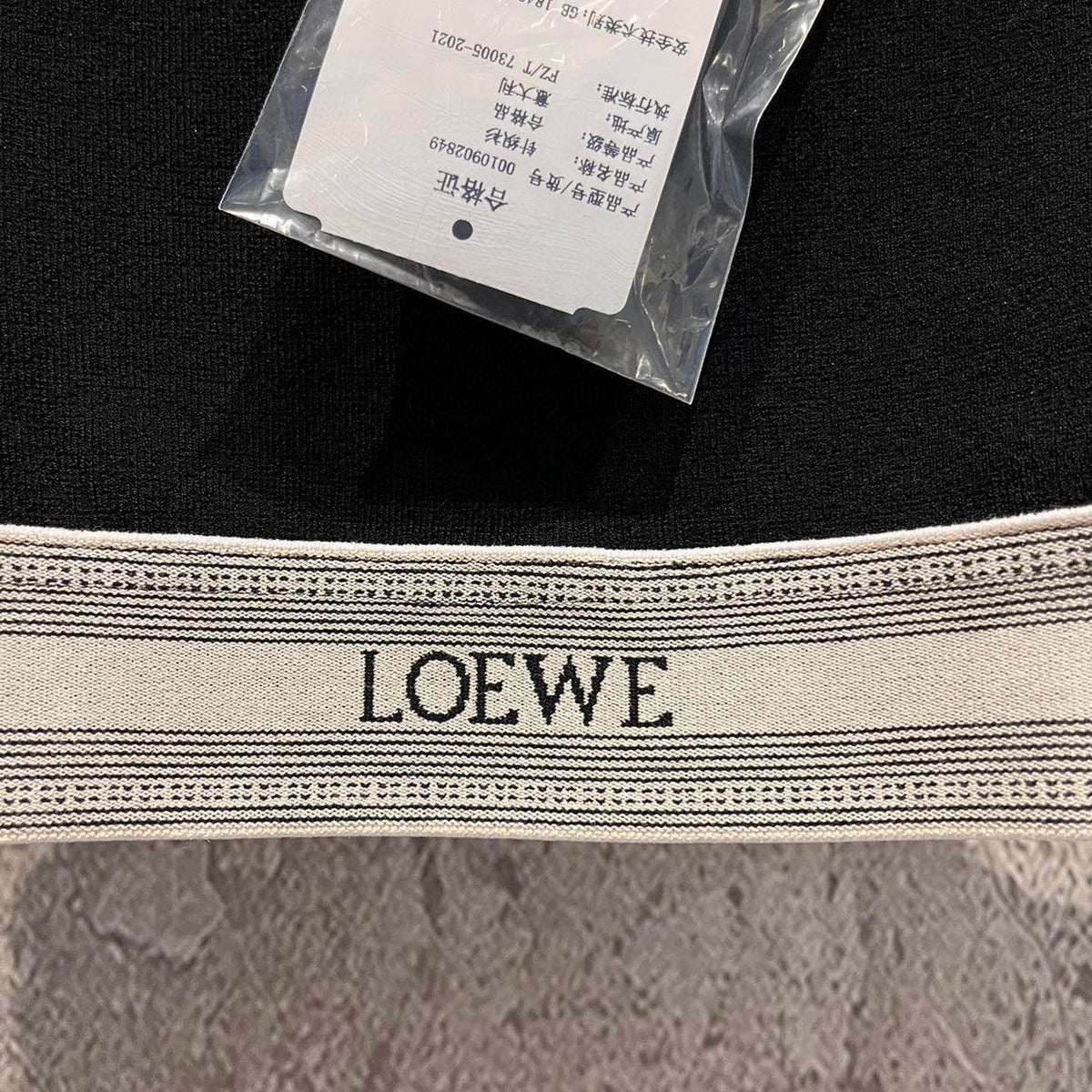 LOEW TOP