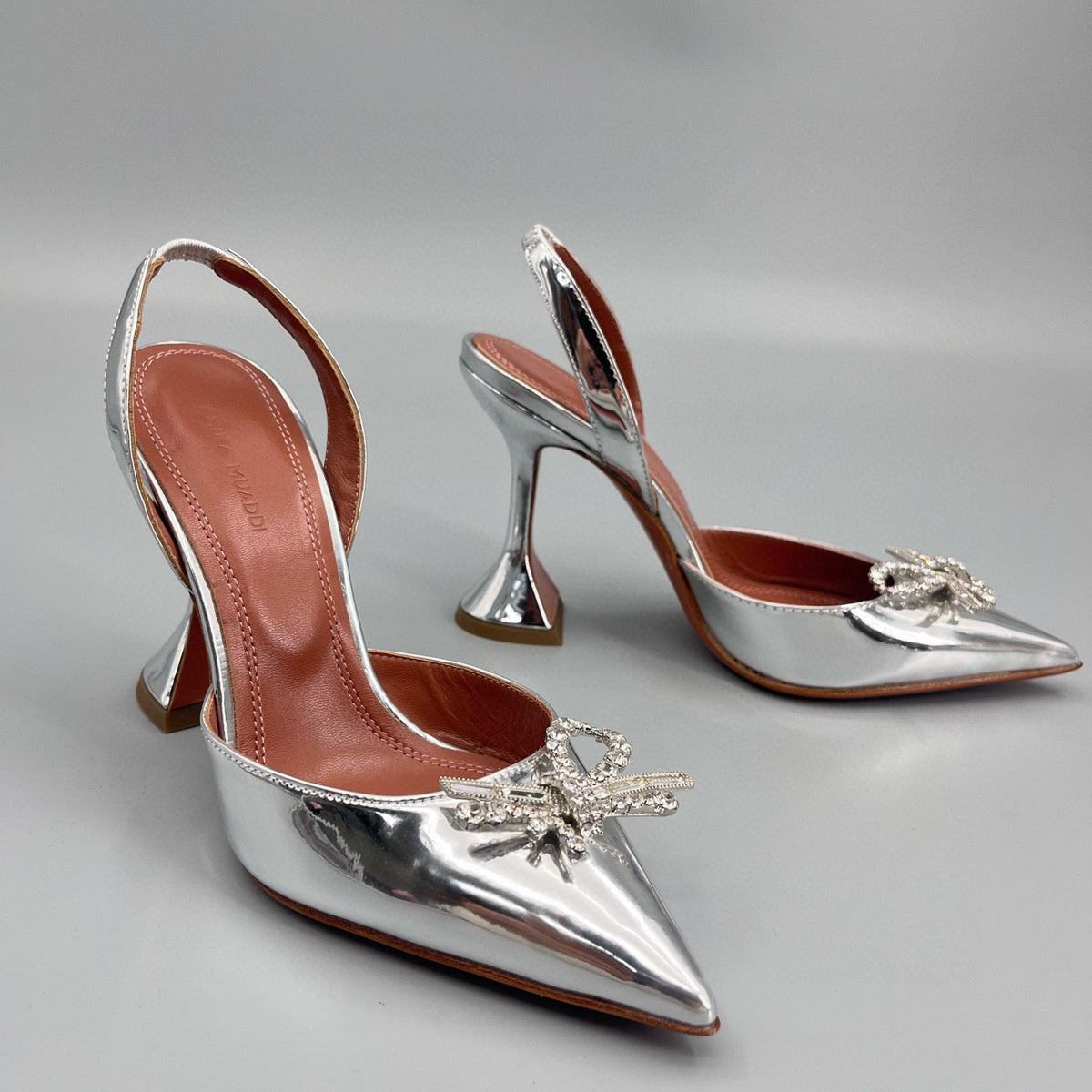 AMINA M HEELS
