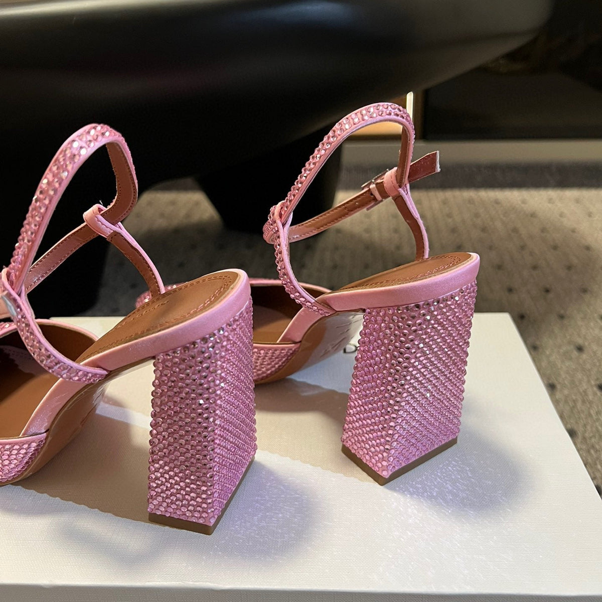 AMINA M HEELS
