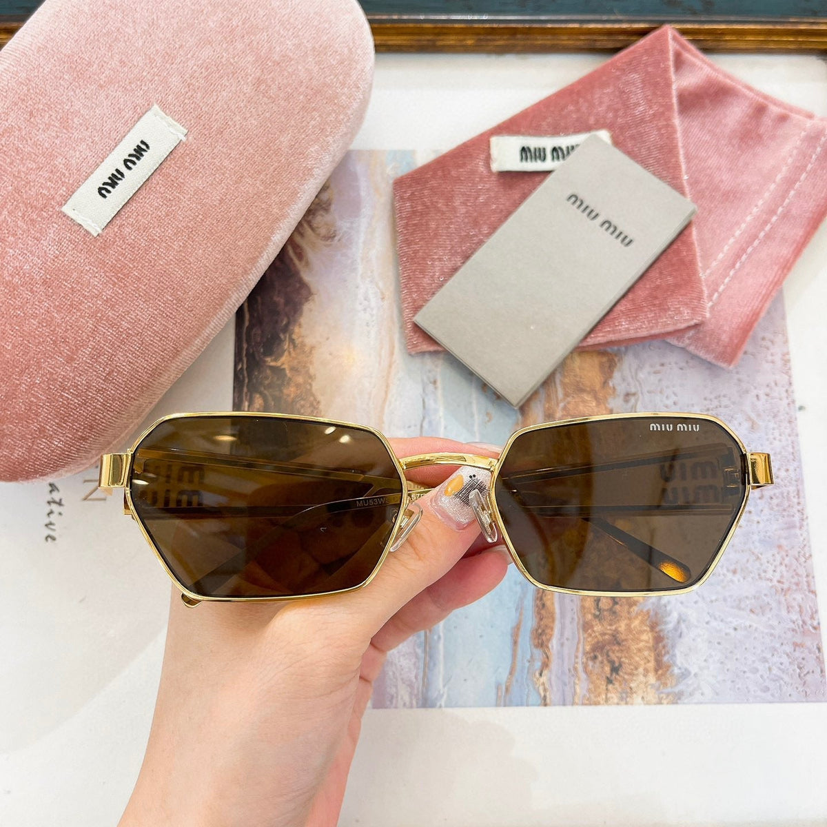 MIU M SUNGLASSES
