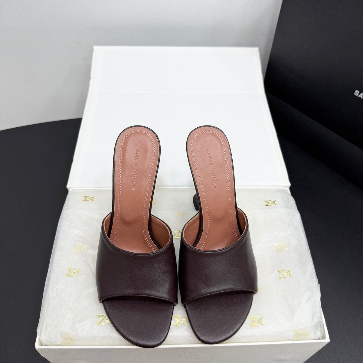 AMINA M HEELS