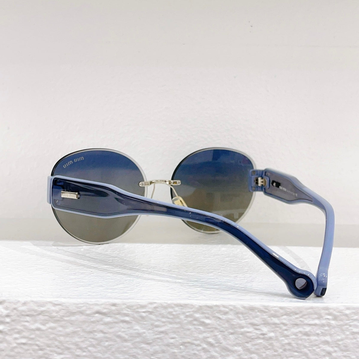 MIU M SUNGLASSES