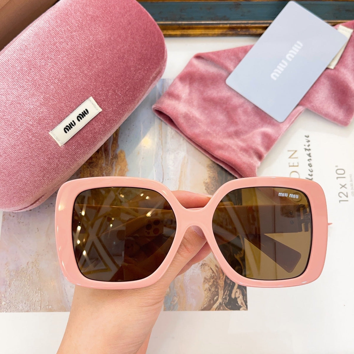 MIU M SUNGLASSES