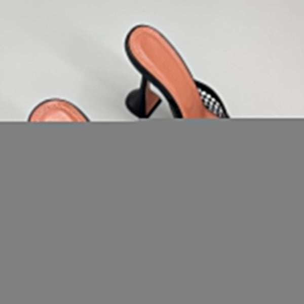 AMINA M HEELS