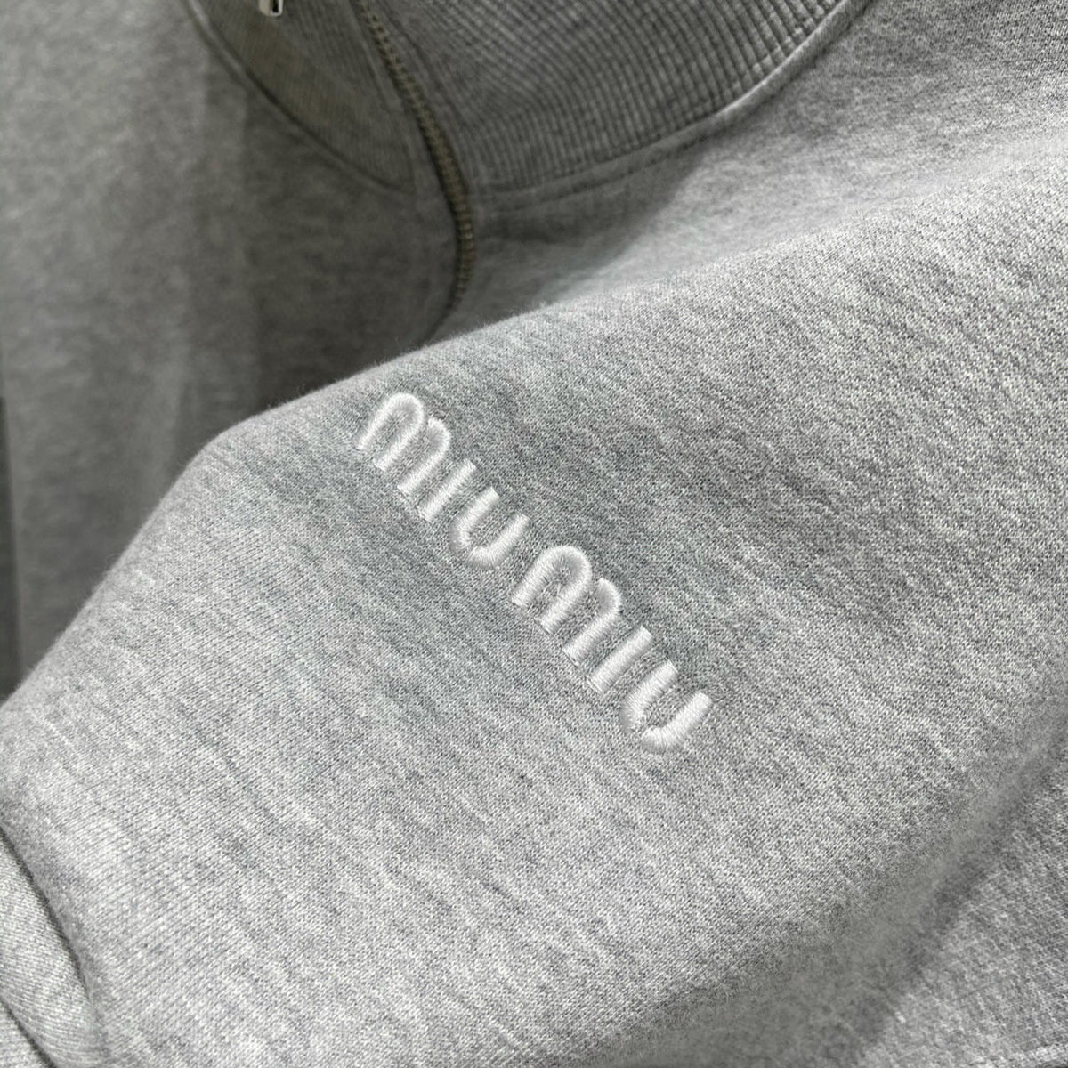MIU M ZIP SWEATSHIRT