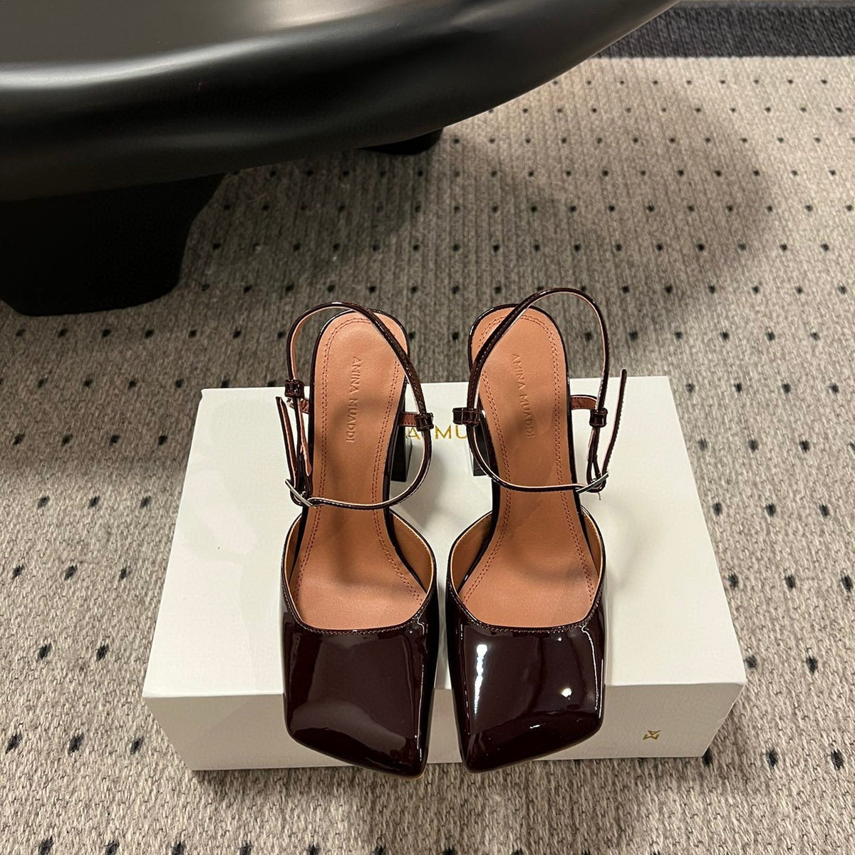AMINA M HEELS