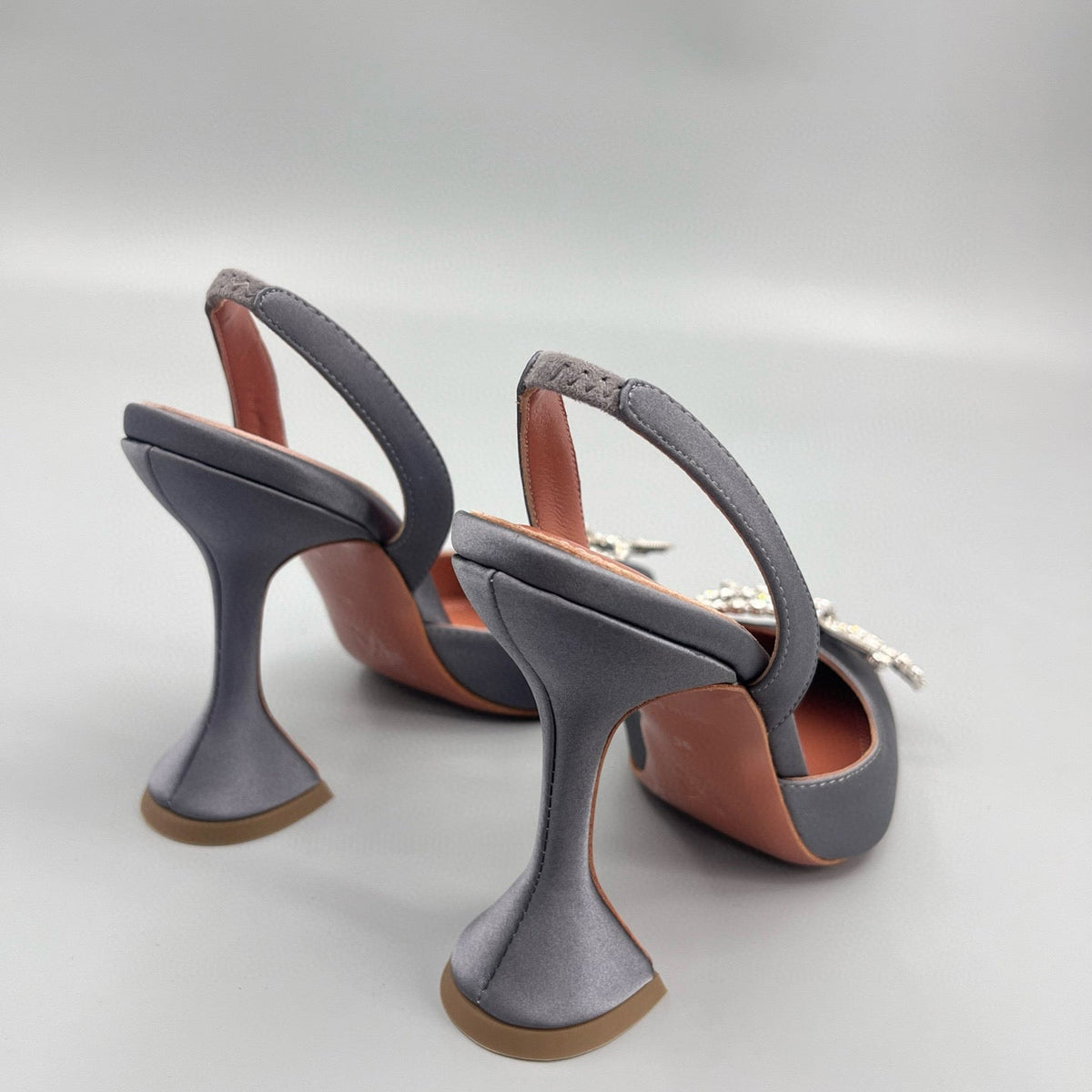 AMINA M HEELS