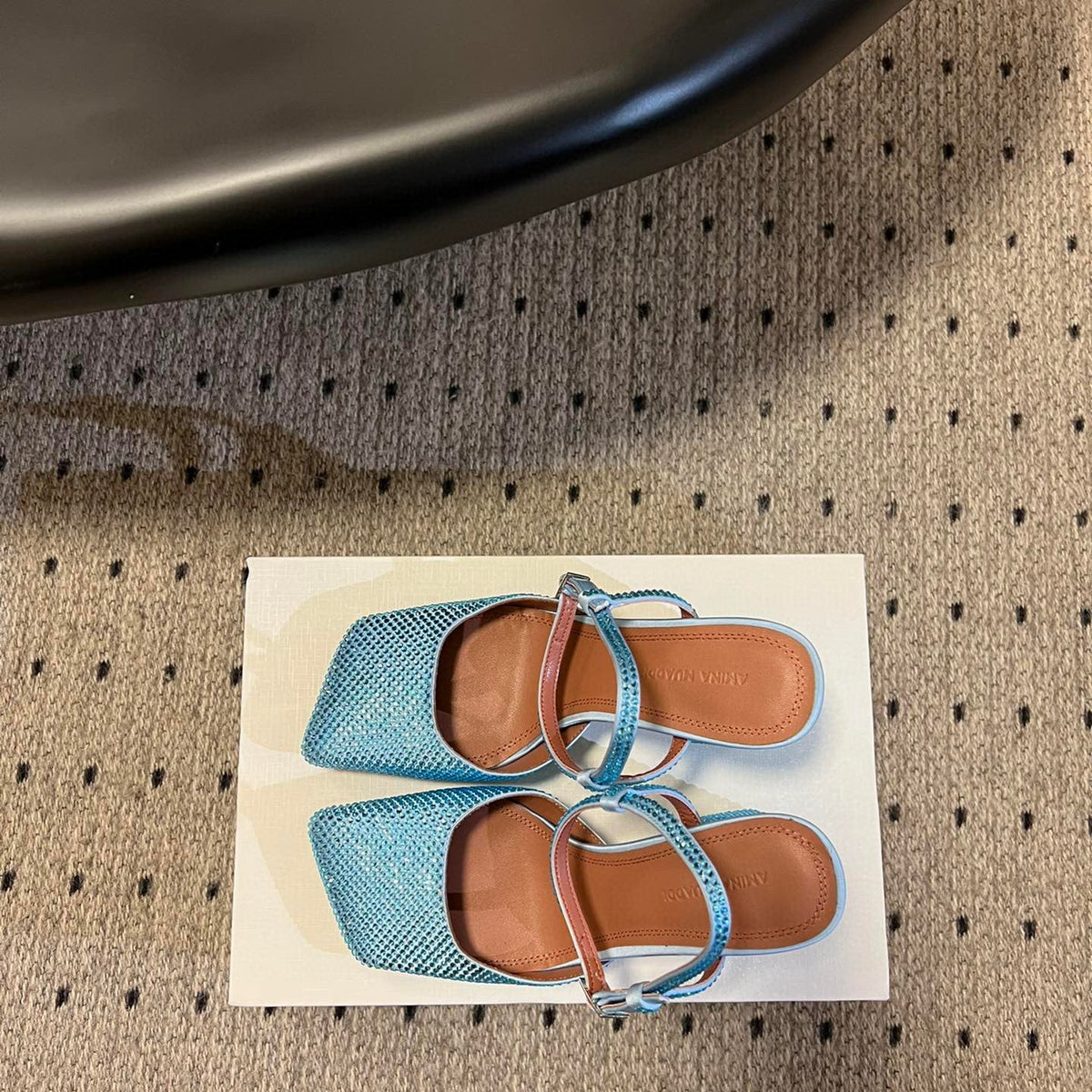 AMINA M HEELS