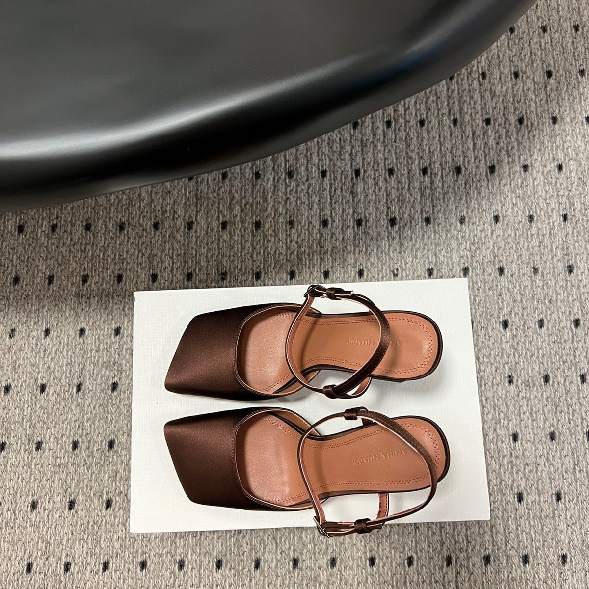 AMINA M HEELS