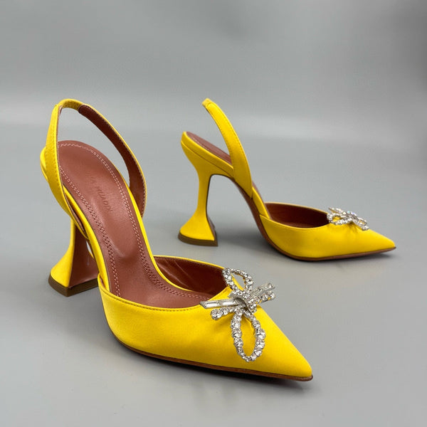AMINA M HEELS