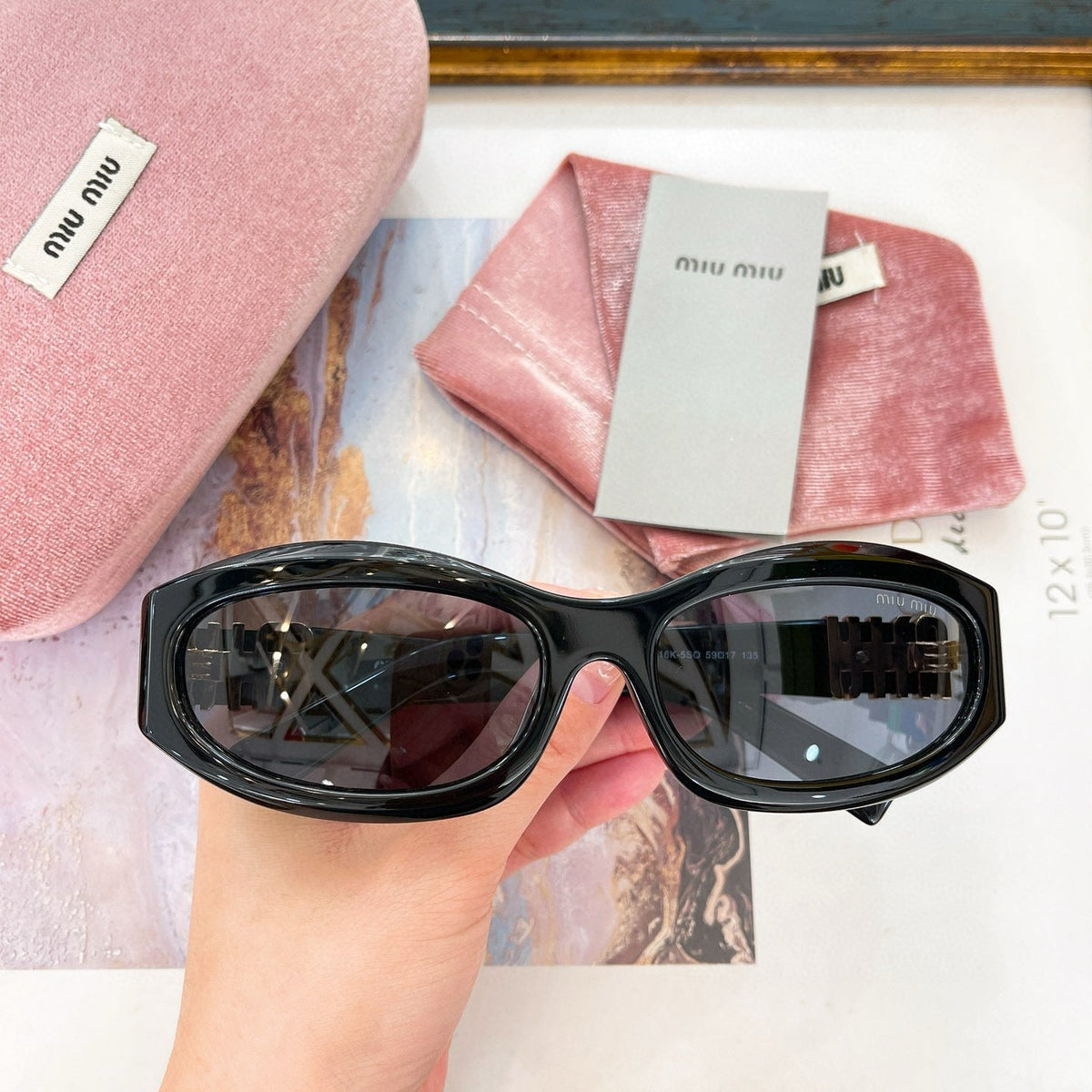 MIU M SUNGLASSES