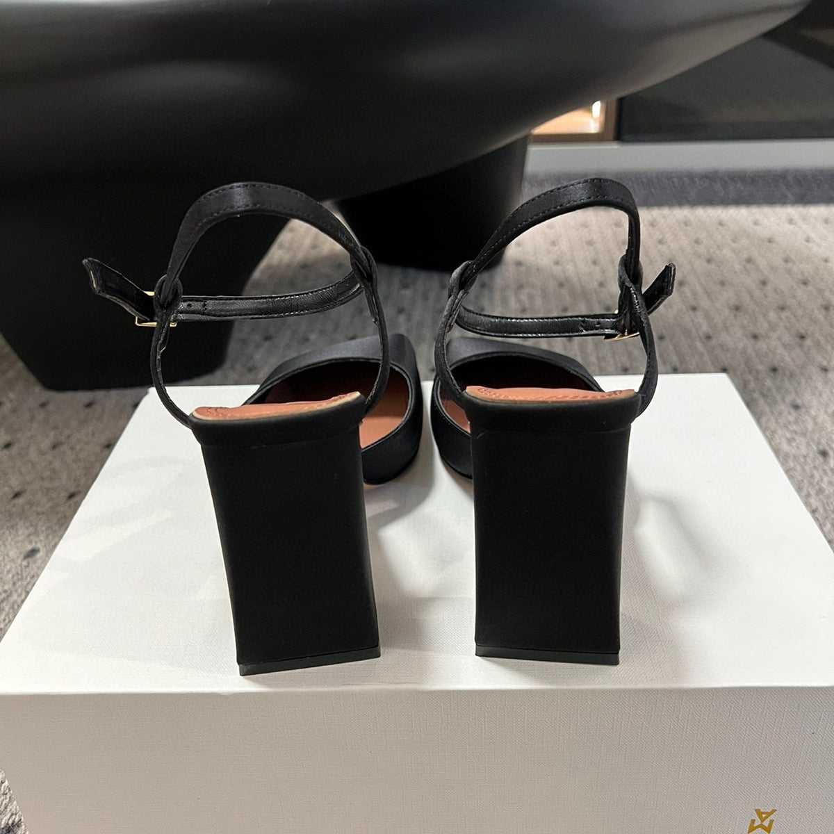 AMINA M HEELS
