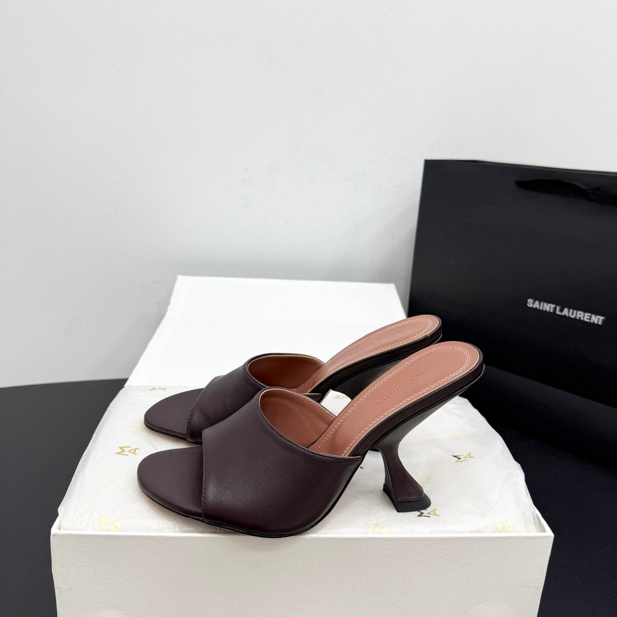 AMINA M HEELS