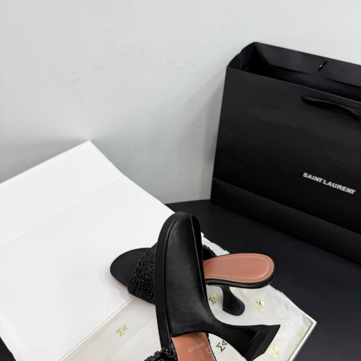 AMINA M HEELS