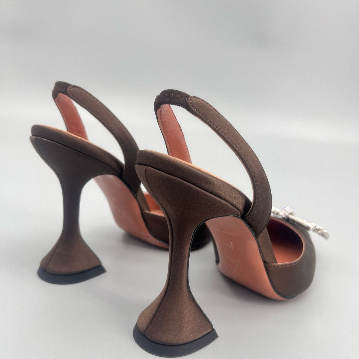 AMINA M HEELS