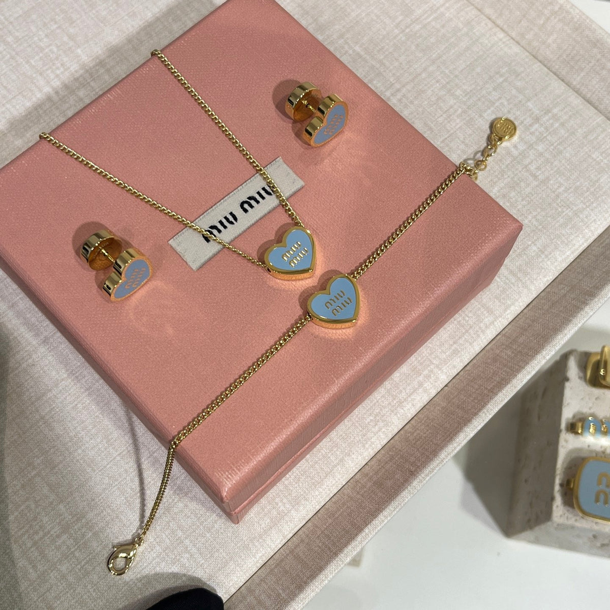 MIU M EARRINGS