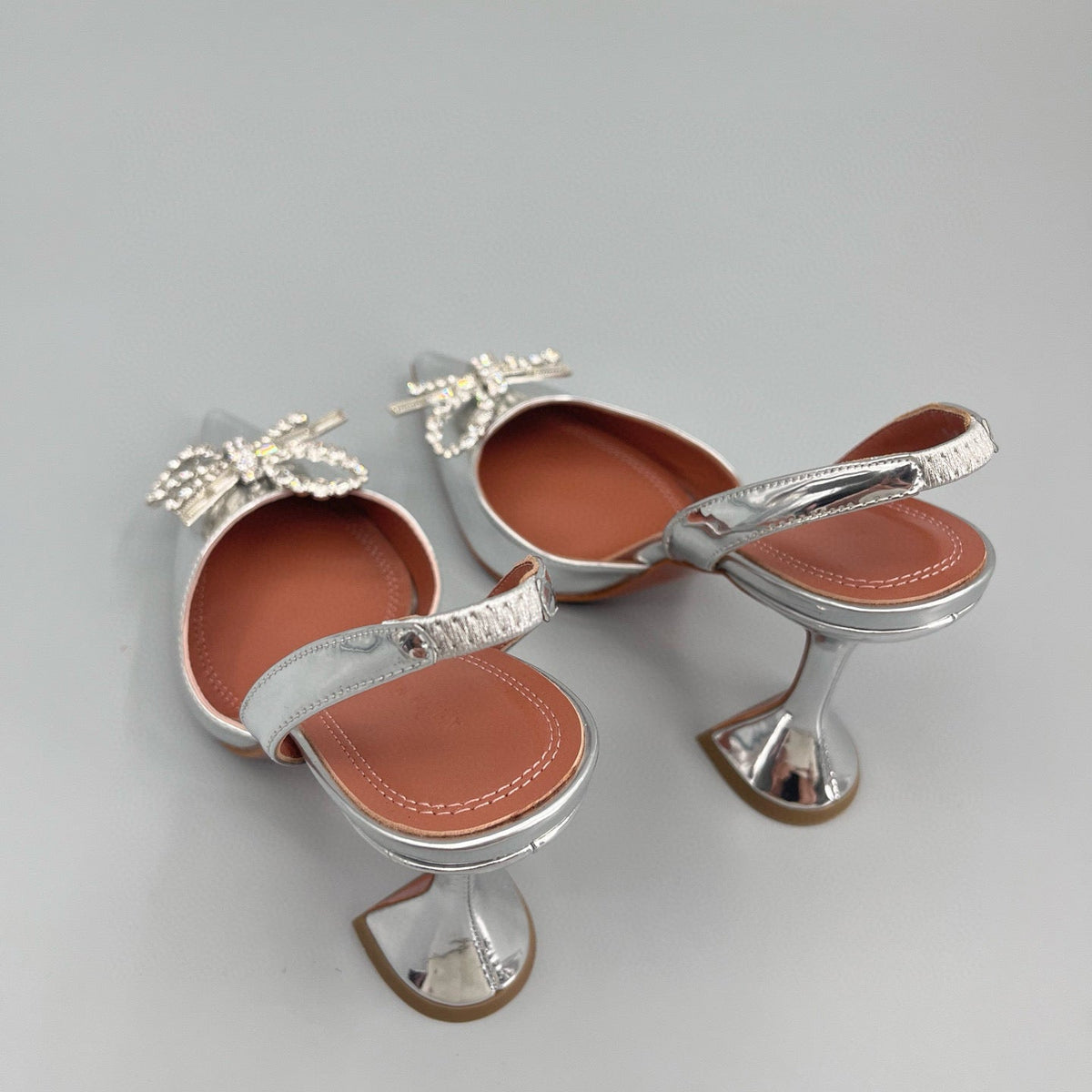 AMINA M HEELS
