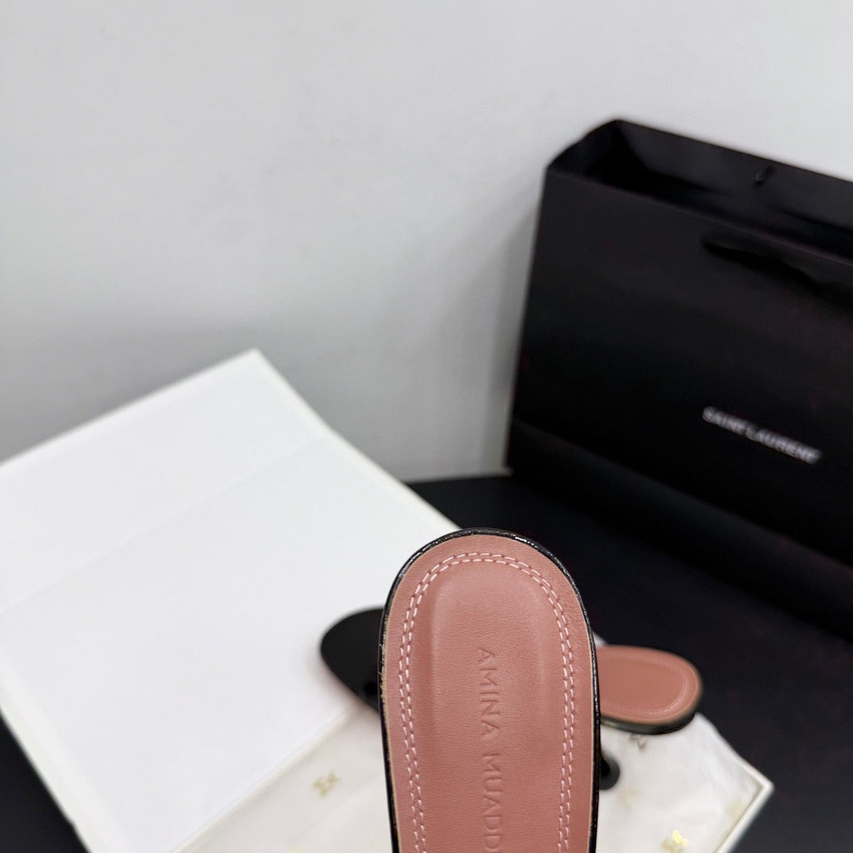 AMINA M HEELS