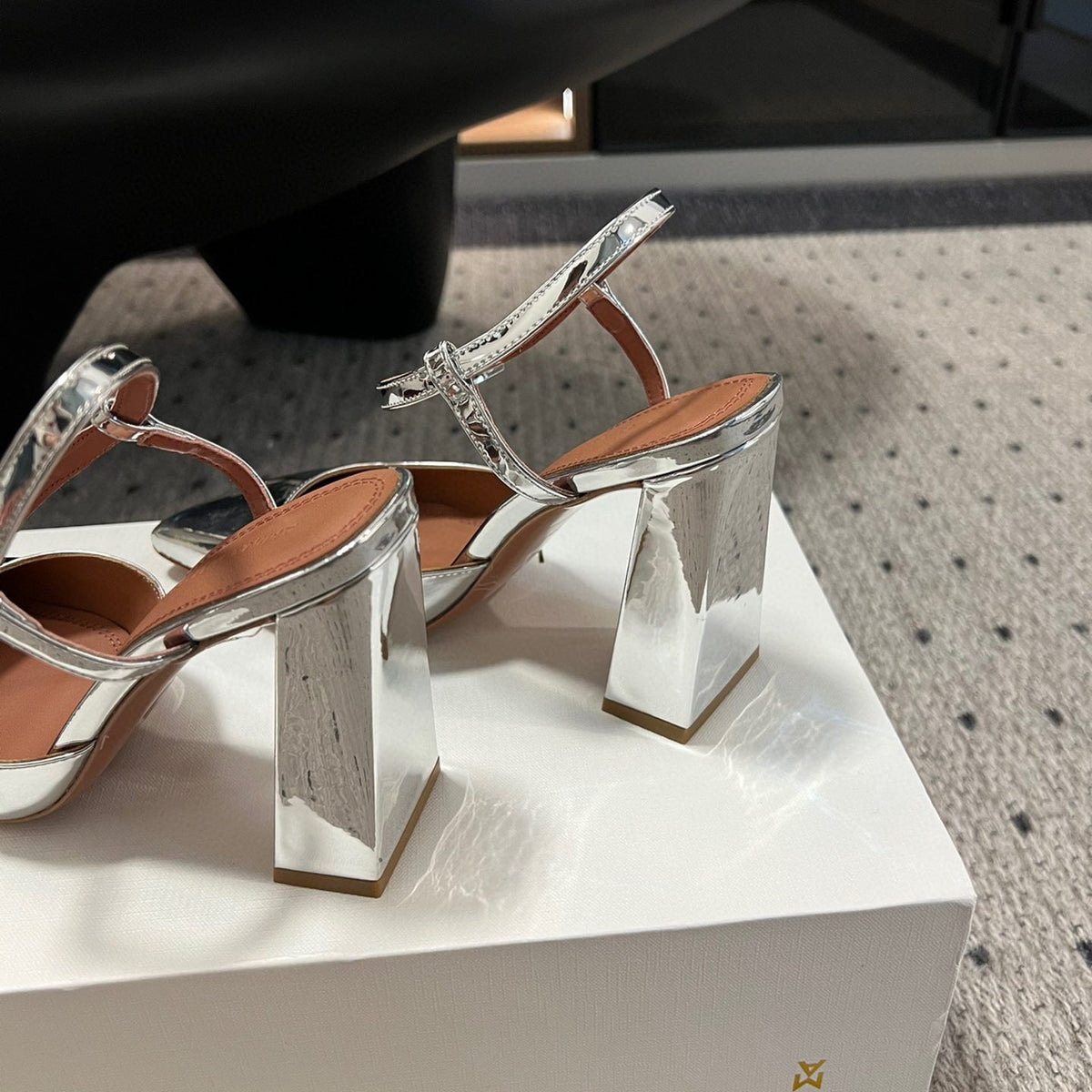 AMINA M HEELS