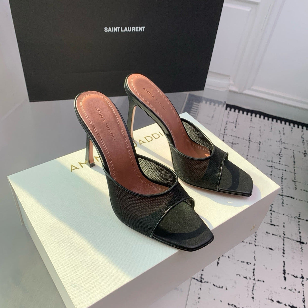 AMINA M HEELS