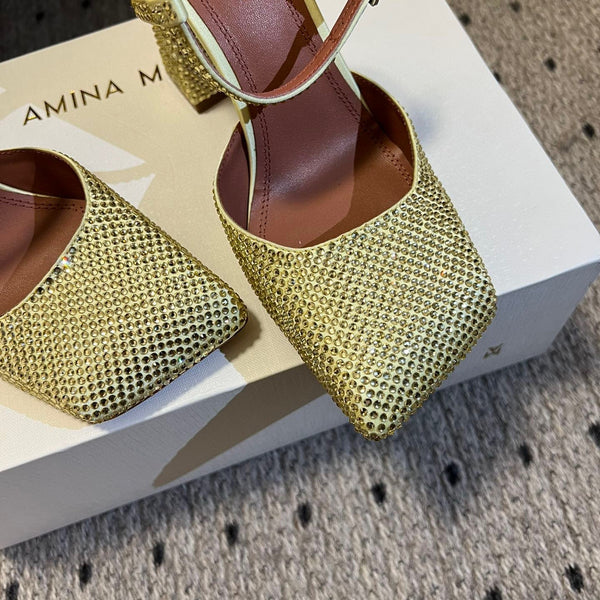 AMINA M HEELS