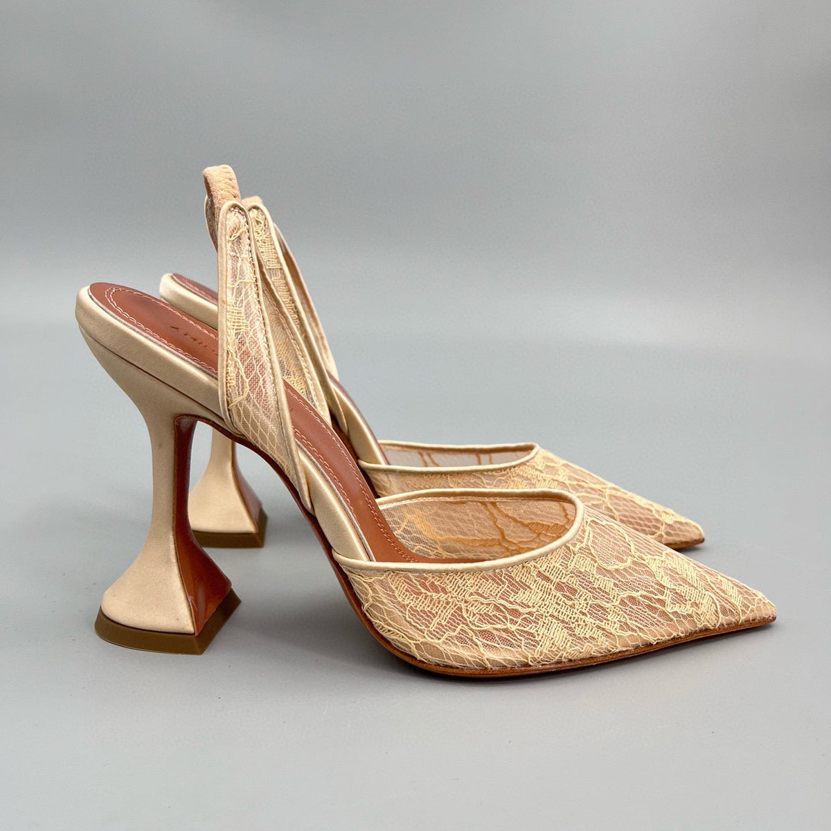 AMINA M HEELS