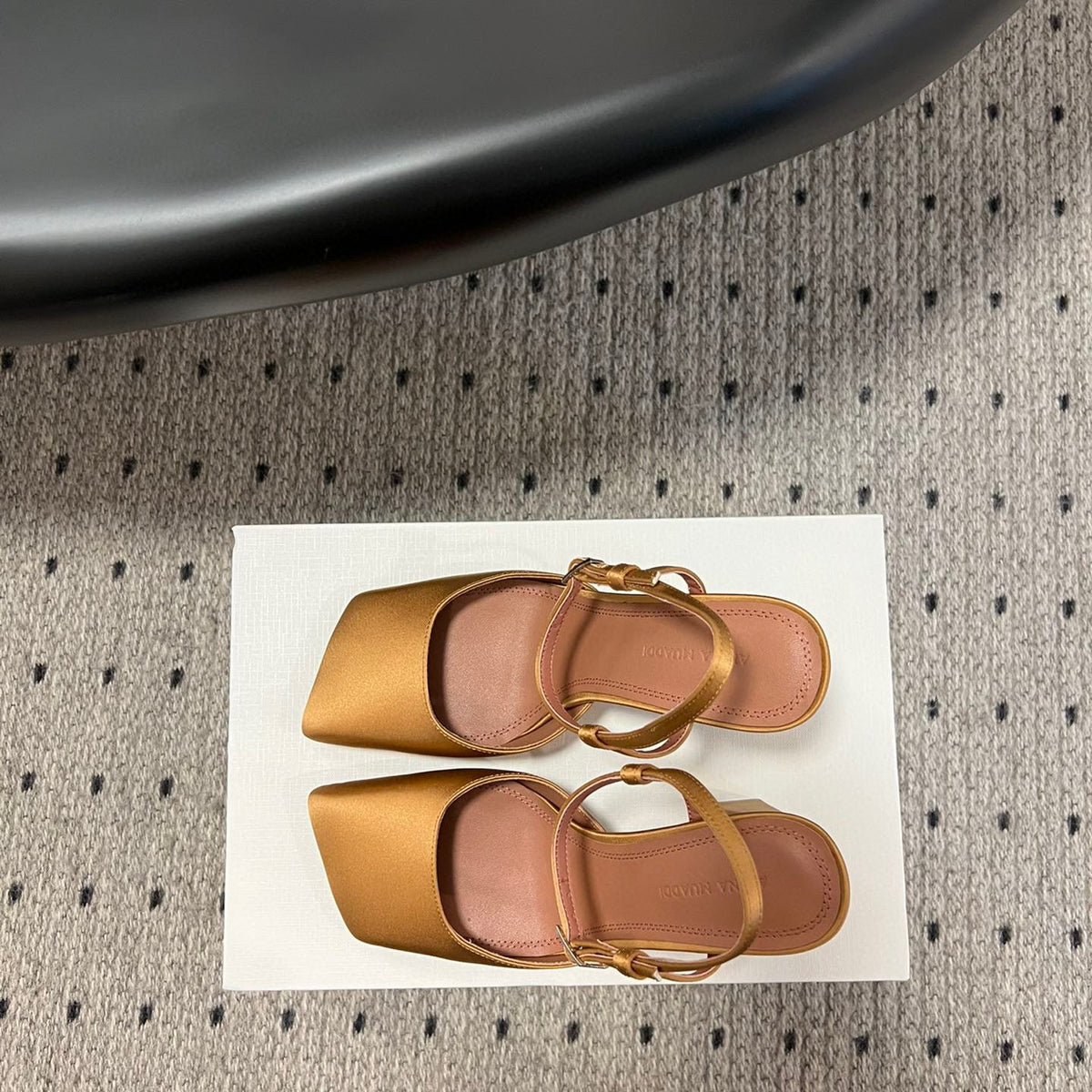 AMINA M HEELS